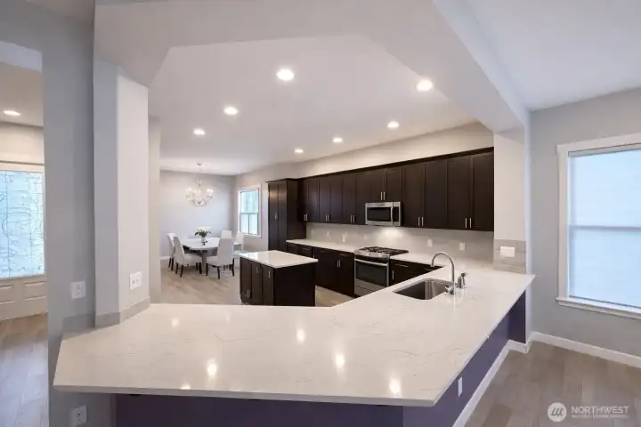 Really big kitchen (there's still MORE out of frame). Counterspace seats SO MANY, your guests and friends will really enjoy this area. You will, too!
