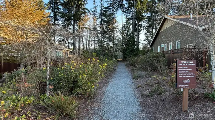 Trail head is just two properties away, and connects you to a wonderful walk, whether on foot alone for some peace and quiet, or with your four-legged friend. Trail loops a long way so many residents bicycle on it, too!