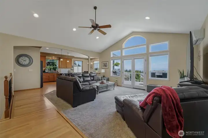 Experience the famous Camano sunrises from almost every room including the open concept great room, gourmet kitchen and dining room that all flow seamlessly onto the expansive view deck.