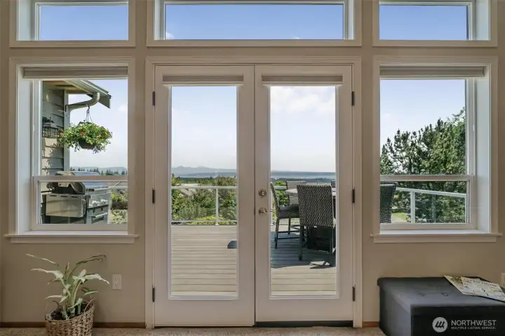 French doors from the main living area take you out to the expansive deck.