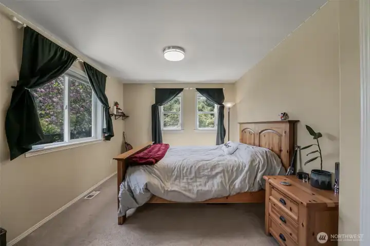 The second bedroom is located off of the second living room.