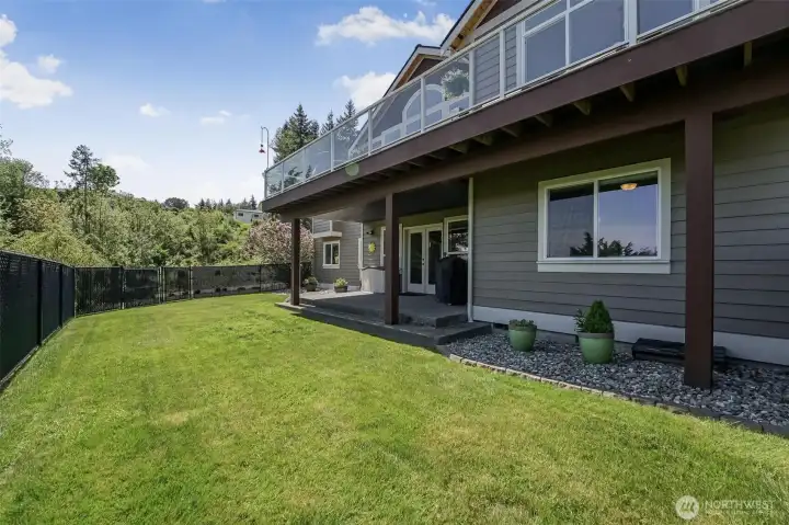 Enjoy the fully fenced portion of the backyard.