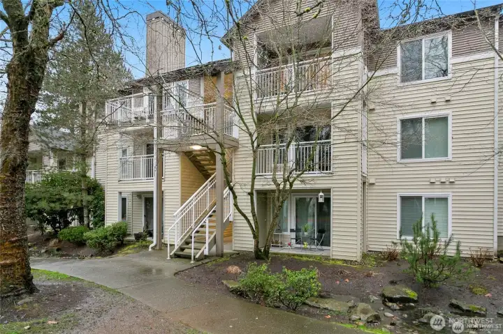 To the left of the stairs, on the coveted top floor you will find this beautiful home.