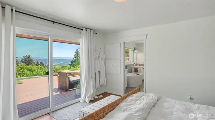 Primary bedroom with outside access and view. Primary bedroom with outside access and view.