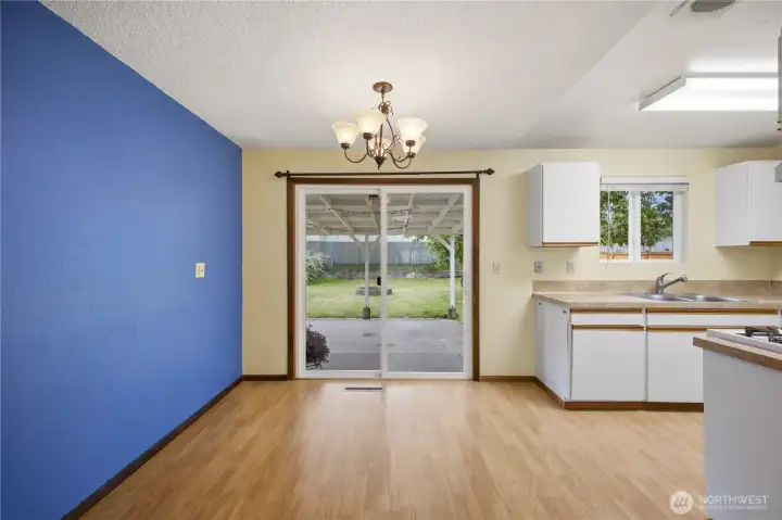 Enjoy backyard access straight from the dining area through the sliding glass door. Enjoy backyard access straight from the dining area through the sliding glass door.