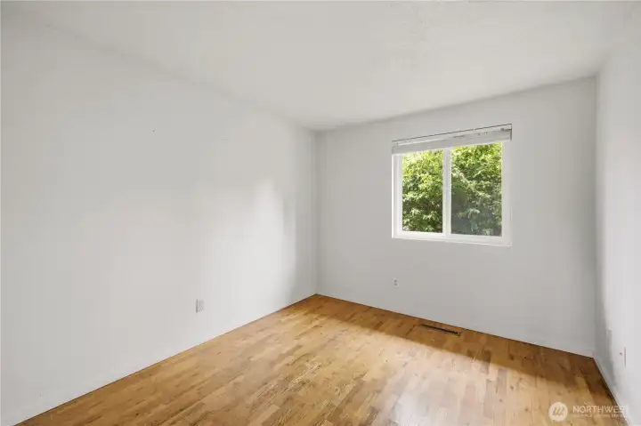 All three rooms feature hardwood floors and clean, functional layouts. All three rooms feature hardwood floors and clean, functional layouts.