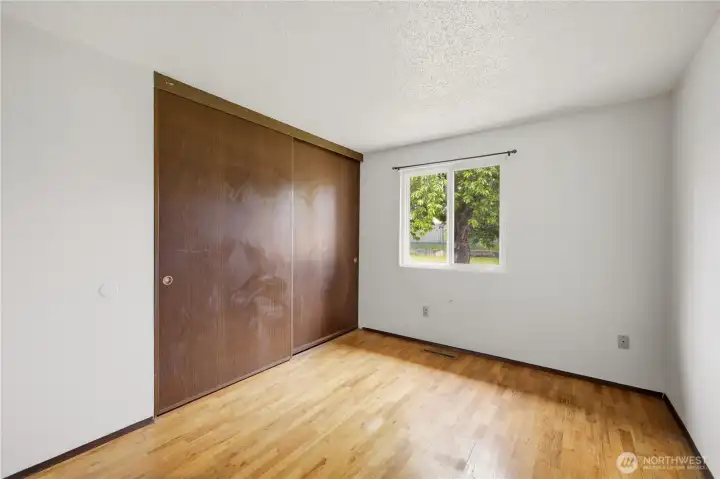 Third room with a view of the backyard. Third room with a view of the backyard.