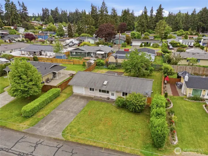 Aerial perspective highlighting the property layout and surrounding greenery. Aerial perspective highlighting the property layout and surrounding greenery.