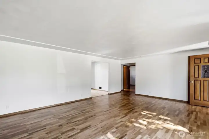 entry way to the left is the dinning/kitchen, to the right is the bathroom and bedrooms.