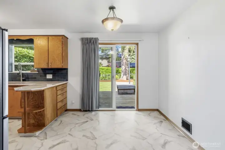 Dinning area off of the kitchen that offers a beautiful view of your backyard