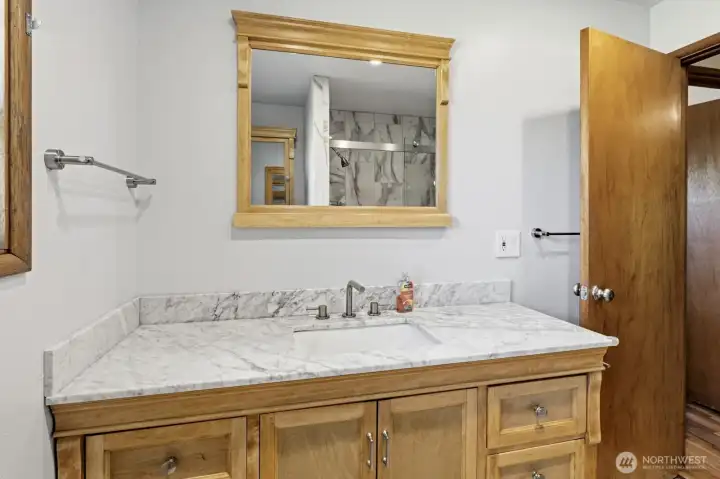 wood cabinet with granite top