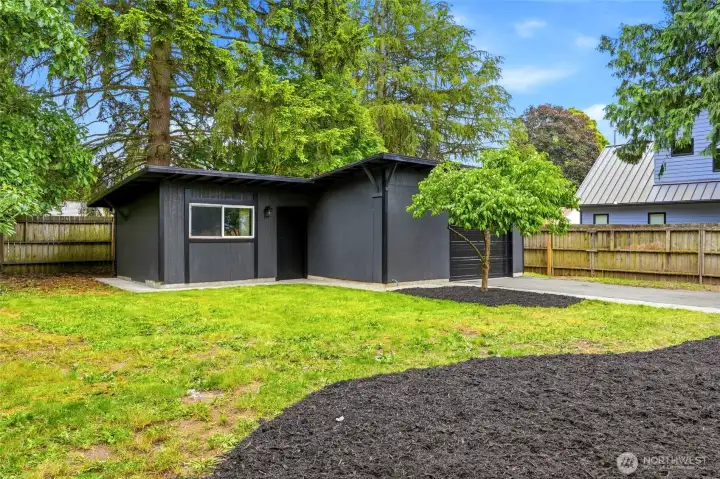 Detached garage with shop and extra parking Detached garage with shop and extra parking