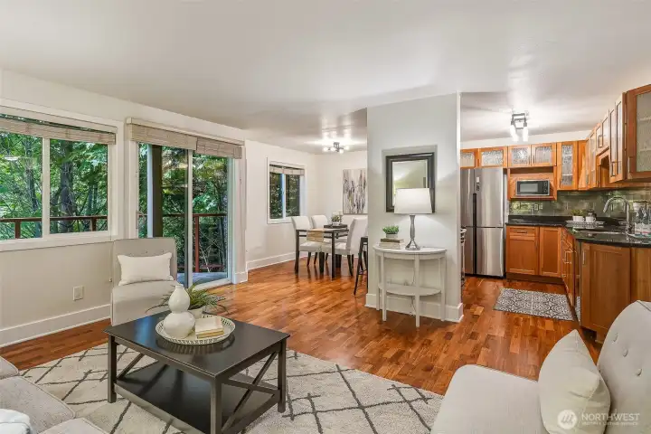 Open-concept layout creates a spacious feel with engineered hardwoods Open-concept layout creates a spacious feel with engineered hardwoods