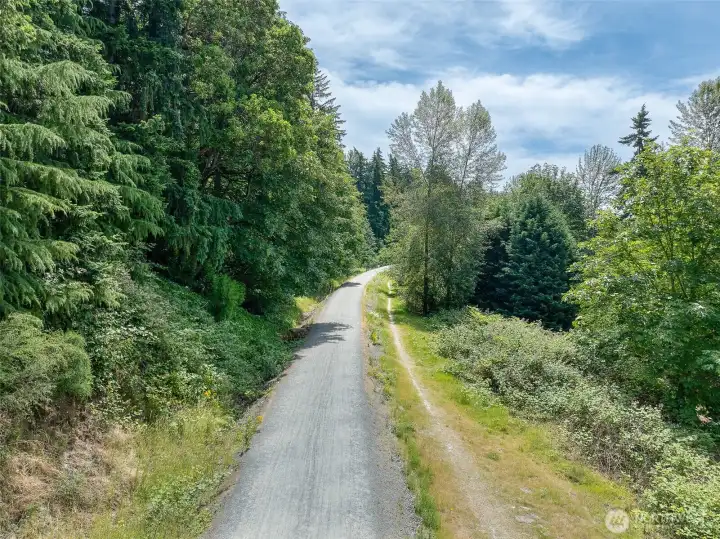 Another view of the Cross Kirkland Corridor trail, offering a peaceful natural setting with easy access to shops, dining, and work Another view of the Cross Kirkland Corridor trail, offering a peaceful natural setting with easy access to shops, dining, and work