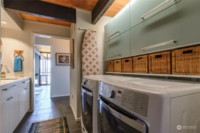 The laundry room and backside of the kitchen offers extra storage.  Washer and Dryer in this pic do NOT convey.