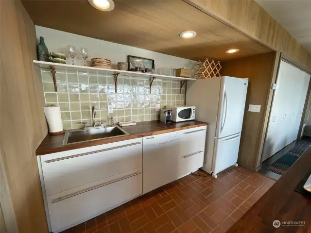 Thoughtfully designed lower level kitchen.  Appliances stay.