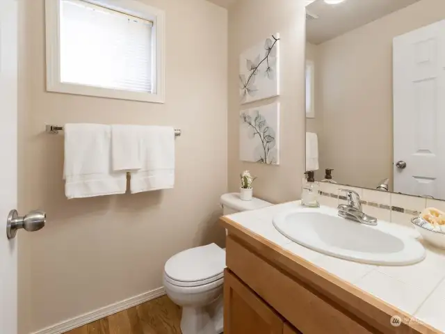 Airy guest bathroom off of the living room