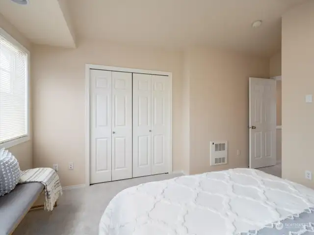 Main Bedroom graced by vaulted ceilings, large closets, and territorial views