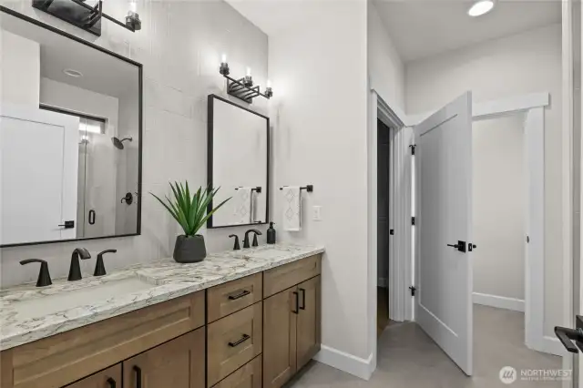 Primary bathroom with walk in shower and closet.