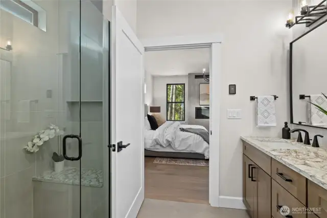 Primary bathroom with walk in shower and closet.