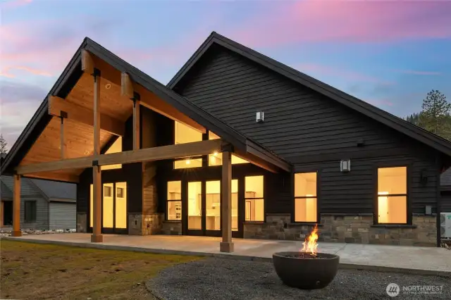Large covered back patio up against the conservancy.