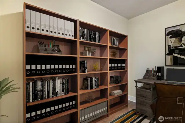 Staged as library second living area