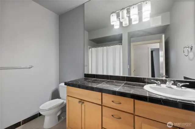 Bathroom has large vanity.