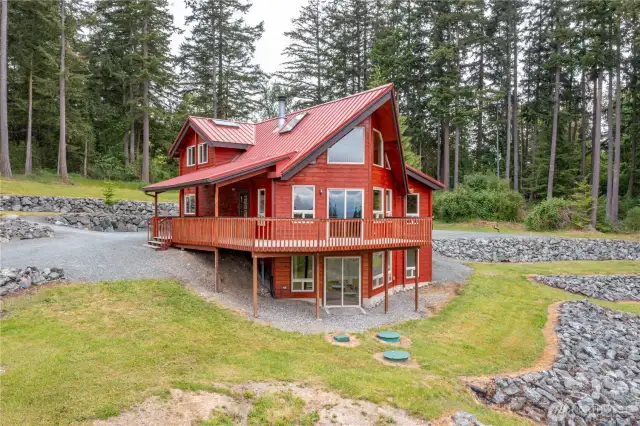 Pristine custom machined log home situated in north Whidbey Island with easterly views toward the mountains and water! A private secluded setting and sweeping entrance, come and see!