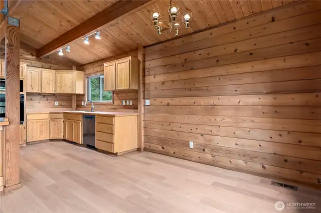 The dining area off the kitchen.  The kitchen has solid wood cabinetry.