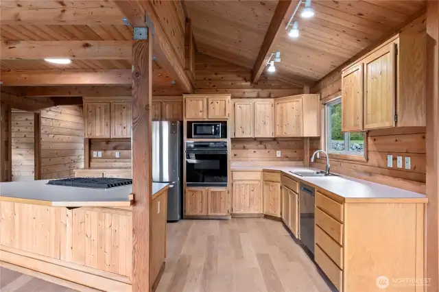 A very spacious kitchen, with new appliances. Plenty of light and views while you cook!
