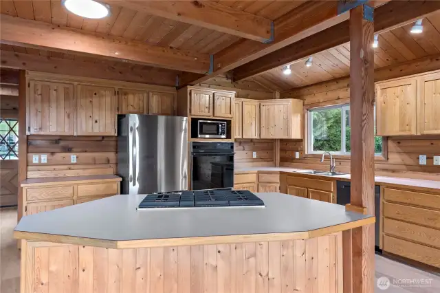 A very large island for ample counter space. All new appliances. Notice the beautiful exposed beams!