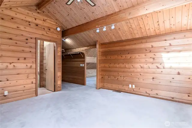 Primary bedroom on upper level with walk-in closet area