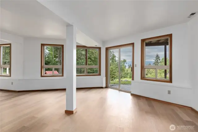 Gorgeous views from the lower level. This large living space has also a separate entrance through slider.
