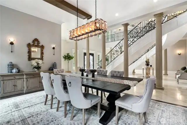 The formal dining room balances sophistication and warmth offering the perfect setting to gather in style. Exquisite Restoration Hardware chandelier sets the mood.