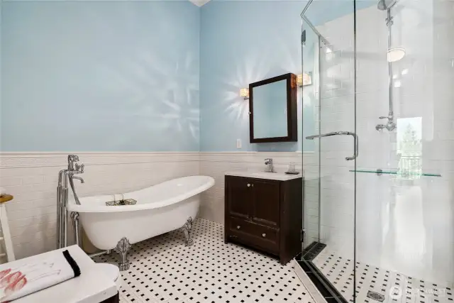 Craftroom/bedroom full bathroom with claw foot soaking tub.