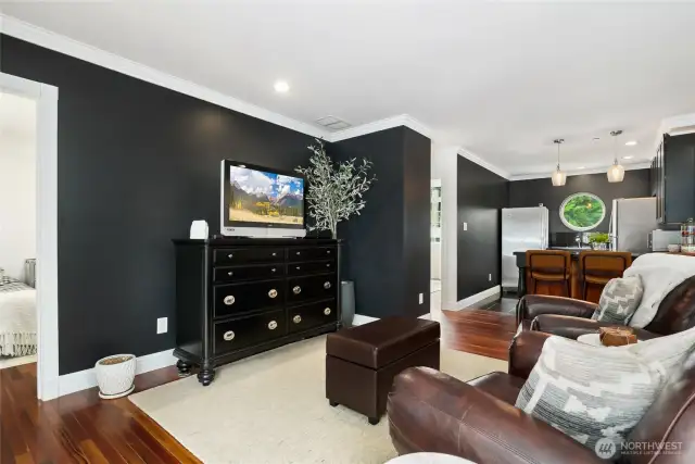 Perched above the detached three-car garage, this charming carriage house offers a cozy and inviting retreat ideal for guests, extended family, or long-term visitors. Boasting an open 804-square-foot floor plan, the space features two comfortable bedrooms and a well-appointed full bathroom, providing privacy and comfort for everyone.