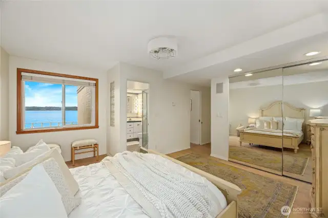 Every room in the home enjoys that fantastic view! Primary br has two closets.