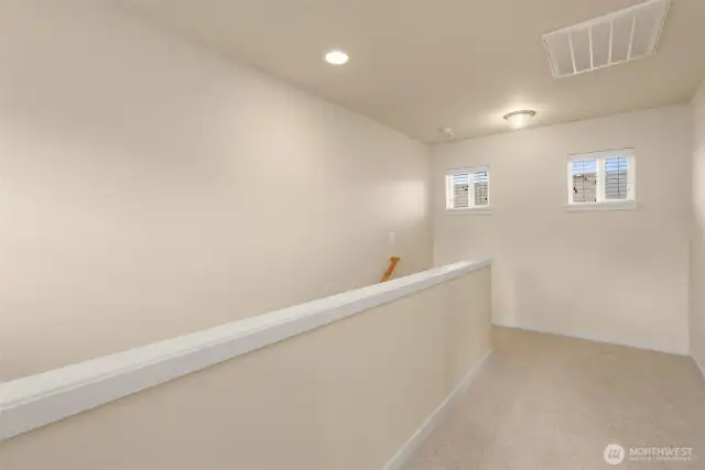 Love the width of the hallway leading to the loft space for your desk