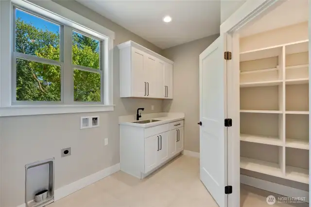 Laundry with walk-in pantry