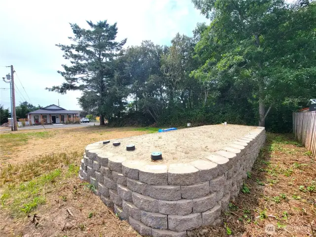 2 Bedroom septic system installed -drainfield at back of lot.