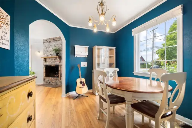 Separate dining room is bright and cheery. The flow of this home is wonderful; moving from kitchen to dining area to the main living area.