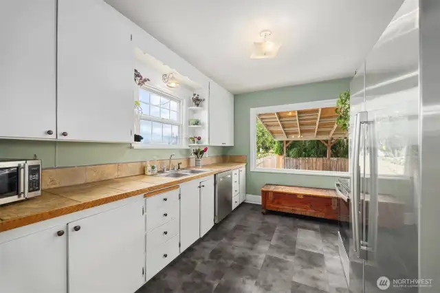Pass through kitchen to the back carport area allows easy movement from the car to the house.