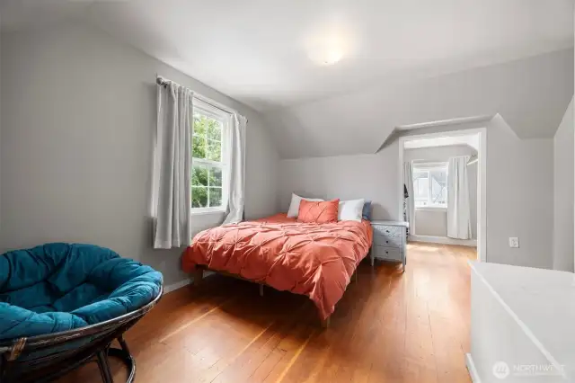 Another upper floor bedroom with a large walk in closet that is big enough for a secret cubby for play or reading a good book.
