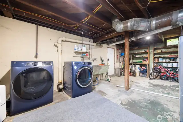 Basement area has the washer dryer hook up, access from outside carport area, and great storage for gear and toys.  This open space also offers additional room for play or work.