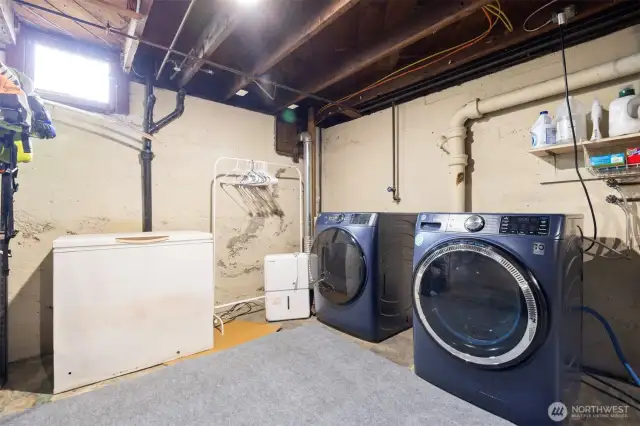 Another view of basement space with natural light.  Room for a freezer or extra fridge. This could be your cubby cave space you always wanted.