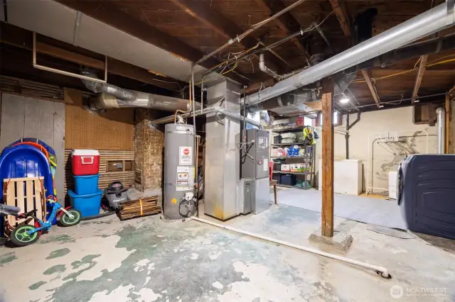 Large storage space in this basement lower level that is accessible from outside as well as from the inside of the house.  Leave as is or do more cosmetic finish work for additional living/play/work space.