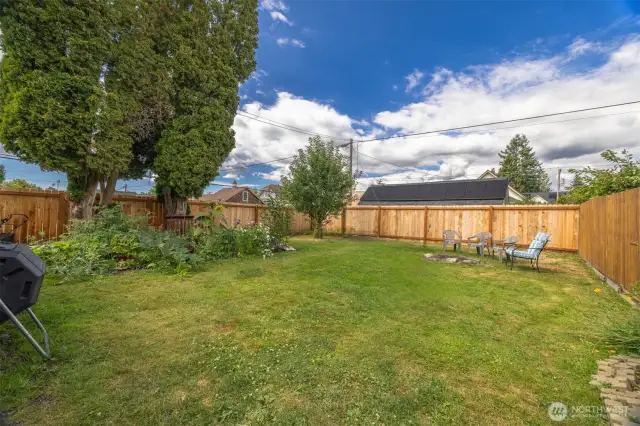 This fenced back yard offers a sweet private space.