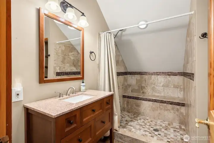 3/4 bath in bonus area above garage.