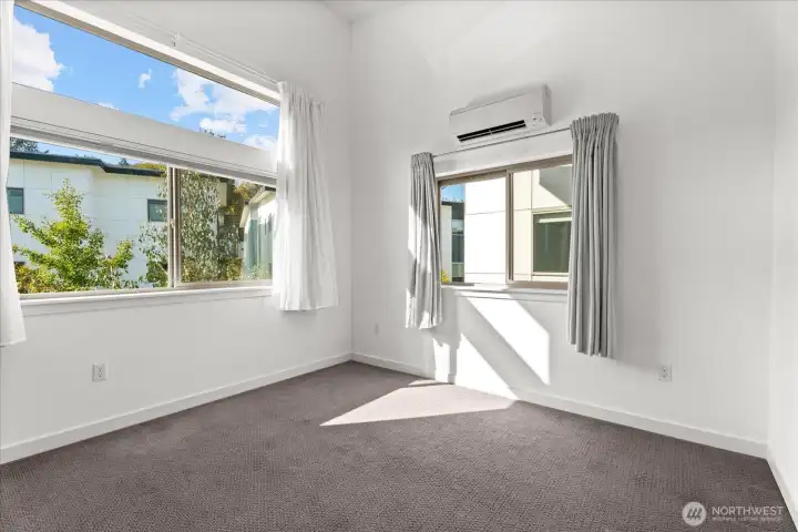 The Mini-Split climate control unit above the window offer AC in the summer and heat in the winter.