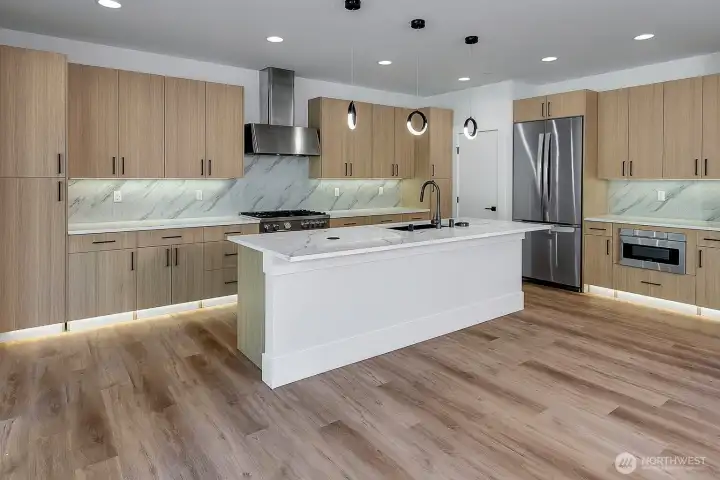 Stainless steel brand name appliances (photo of similar home in separate community)